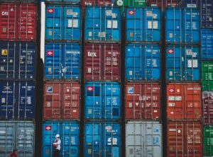 Colorful stacked cargo containers at a shipping yard in Jakarta, Indonesia.