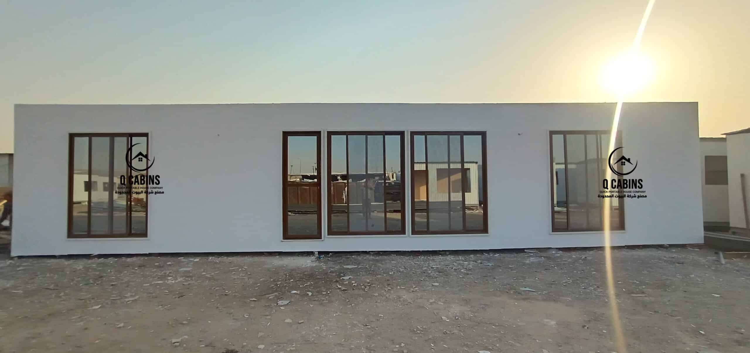 Front view of white insulated cement board prefabricated cabin unit