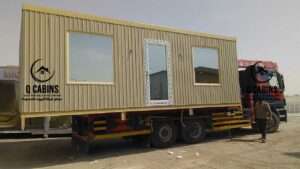 Transporting prefabricated shinko porta cabin on flatbed truck