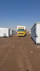 Transporting prefabricated shinko porta cabin on flatbed truck