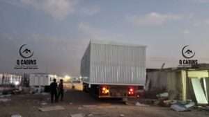 Transporting prefabricated shinko porta cabin on flatbed truck