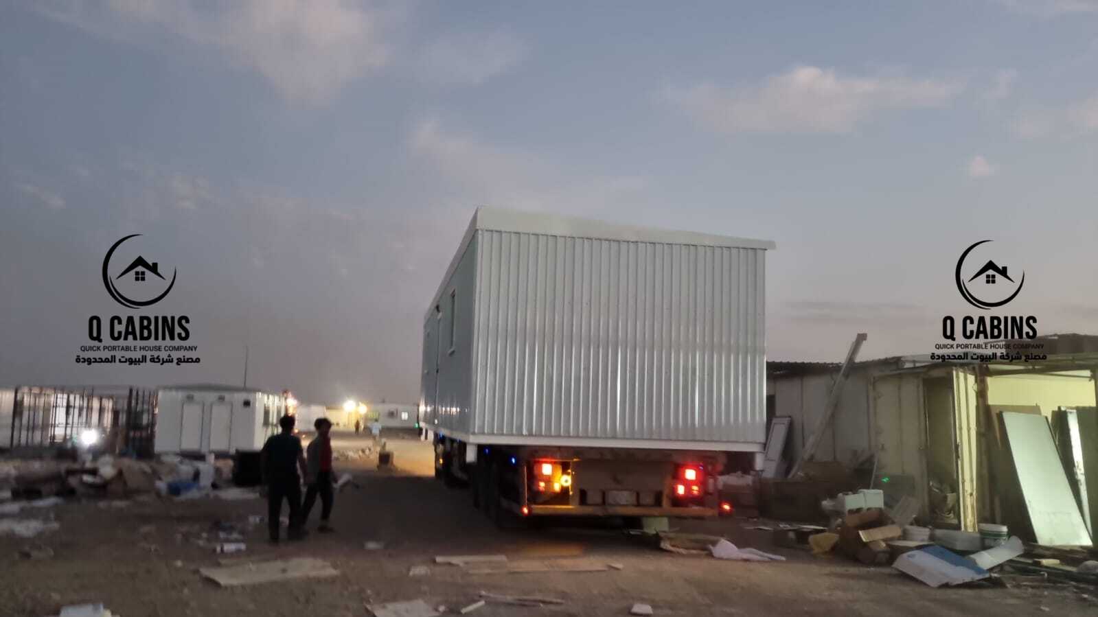 Transporting prefabricated shinko porta cabin on flatbed truck