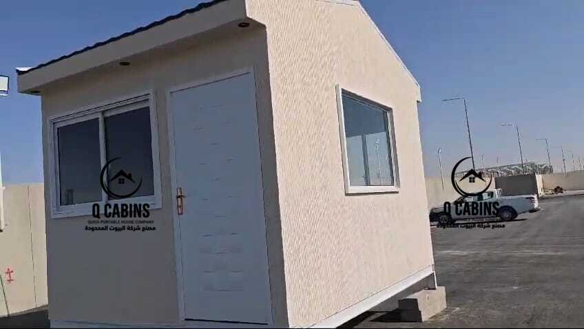 Small standalone prefab room unit with single window.