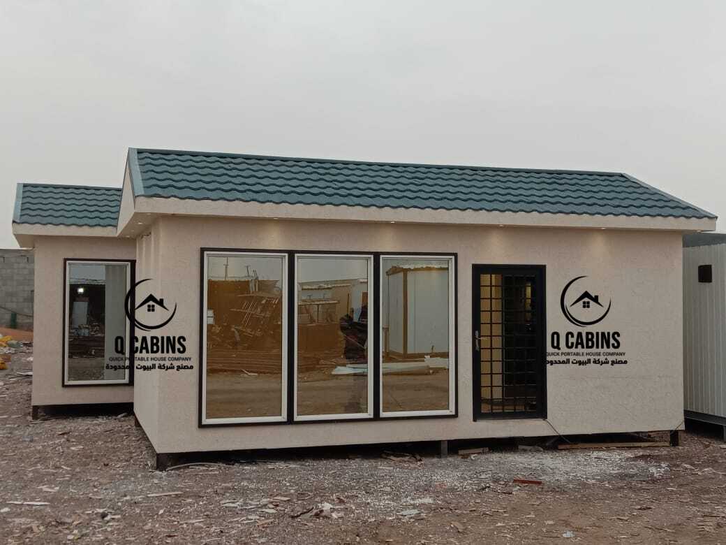 Row of multiple connected prefab Cement Board Porta Cabin units on site