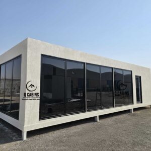 White prefab porta cabin structure with full-length glass windows