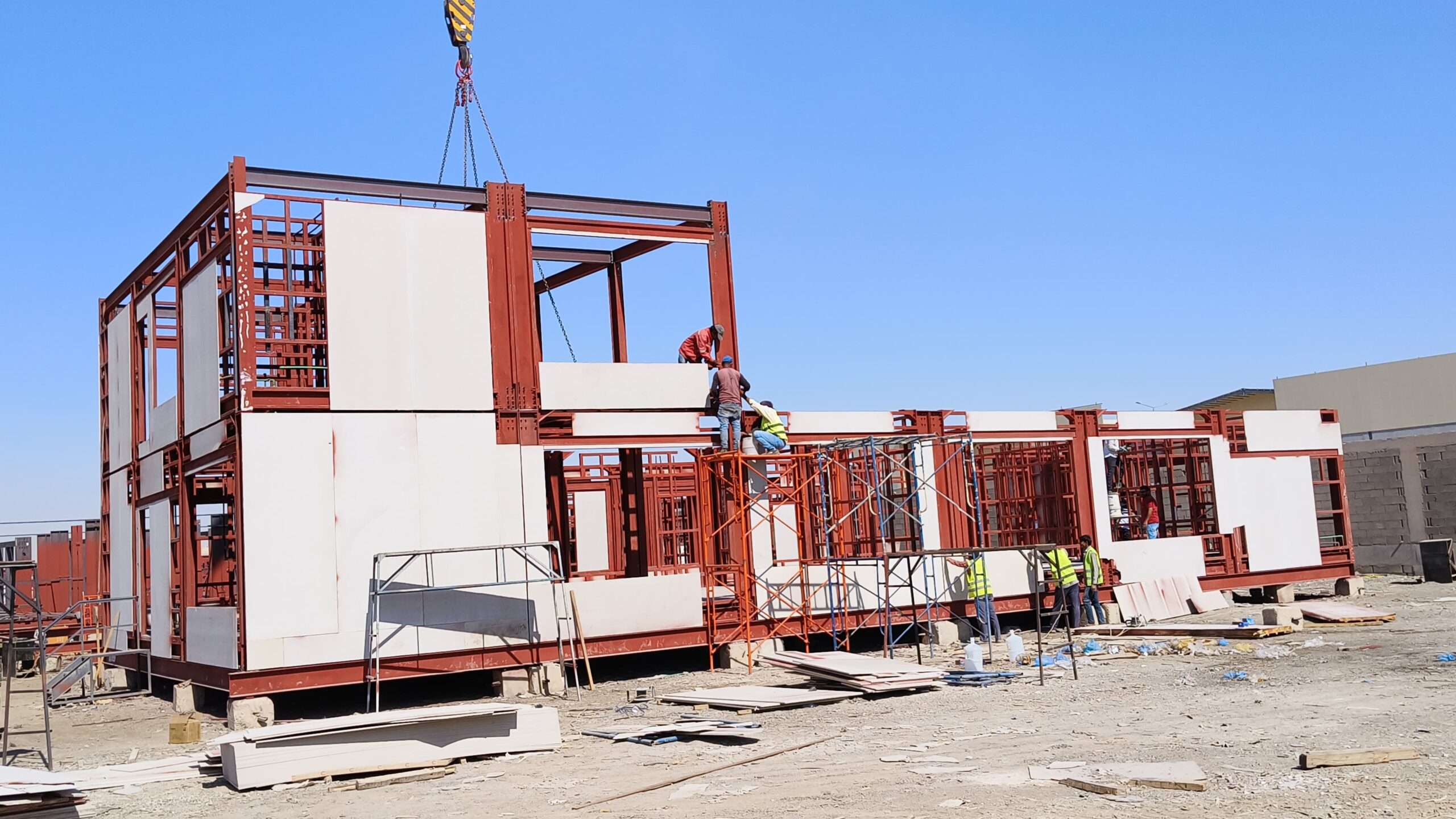 Modular site office installation using sandwich panel cladding in Riyadh construction site