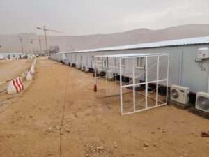 Site office walkways and temporary shaded structures for workers in Riyadh construction site