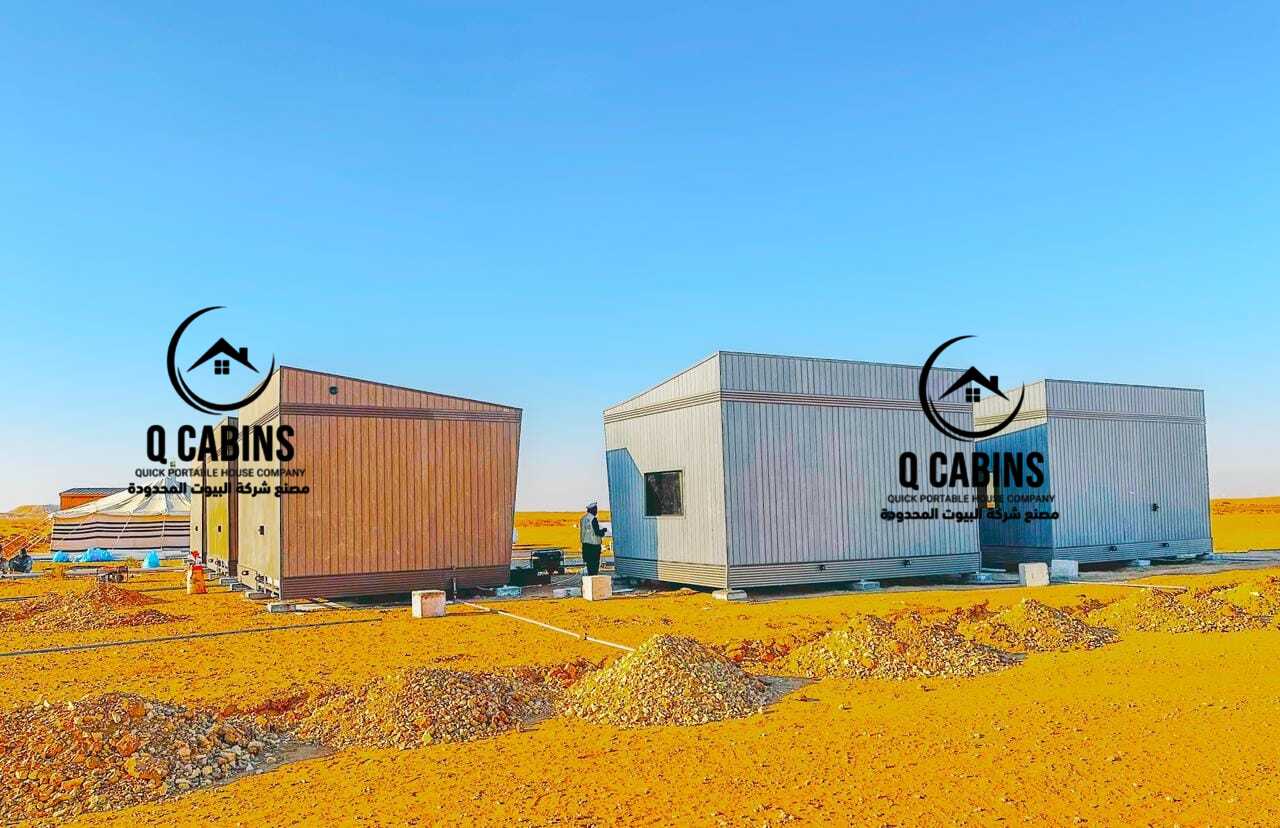 Small portable cabin prefabricated unit with modern grey cladding installed outdoors