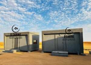 Modern WPC wood plastic composite and cladding modular prefabricated houses installed in desert location