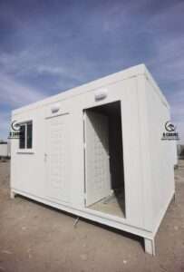 White sandwich panel site cabin with open door and window