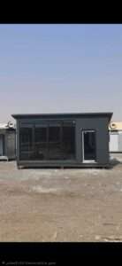 Modern dark grey glass front sandwich panel porta cabin office
