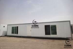 White portable sandwich panel cabin with security window bars and entrance door